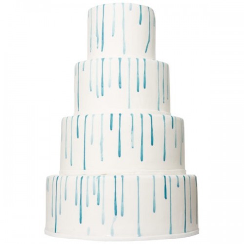 a white wedding cake with blue drip as decor is a very creative and cool idea to rock, it looks modern and unusual