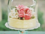 a single layer buttercream wedding cake with fresh blooms on top is an idea that always works