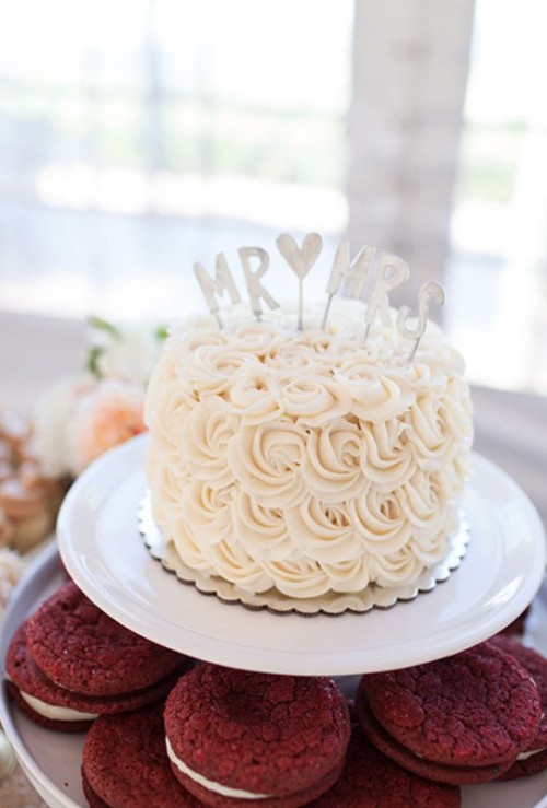 a white textural rose buttercream with Mr and Mrs toppers is a classic option to try