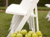 green apples placed in crates along your wedding aisle will be not just a decoration but also a stack of wedding favors, great for a summer or fall wedding
