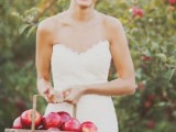 a metal basket full of apples can be used as a wedding decoration or a pack of wedding favors