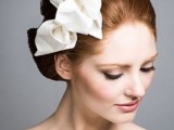a large white silk bow is a creative headpiece you may rock, and it can be easily DIYed and attach to your hair