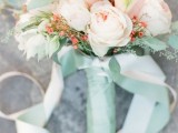 accent your wedding bouquet with long silk ribbon of the colors that match your blooms and match your wedding color scheme