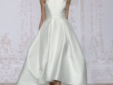 an A-line midi silk wedding dress with a halter neckline and a full skirt is a lovely idea for a modern or minimalist wedding