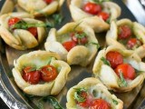 pastry cups with cheese, greenery and sun dried tomatoes are tasty and fall tomatoes will be super delicious