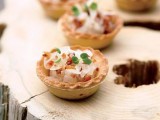 tartlets with greenery and fresh veggies are a timeless appetizer idea for the fall