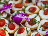 mini sandwiches with cheese, sun dried tomatoes and fresh greenery wil remind the guests that it’s harvest time
