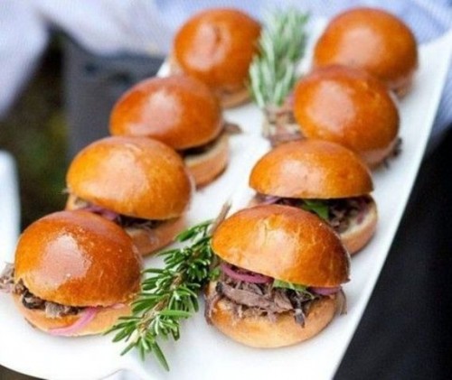 mini sliders filled with meat or chicken and greenery are a great idea for fast food lovers