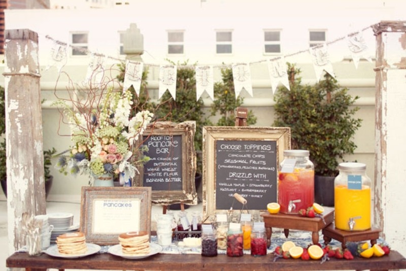 A pancake food bar, berries, fruits and fresh lemonade is a cool brunch wedding idea