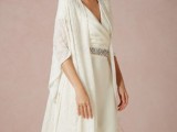 a beautiful long lace and fringe coverup is a timeless idea for a bride who wants a romantic touch to her look