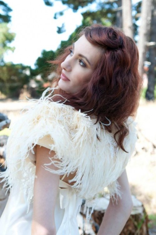 a feather coverup is a chic textural piece that will add style to your bridal look