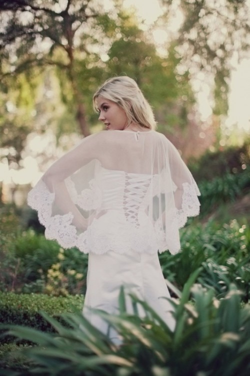 a chic white capelet with a lace edge is a trendy idea right now and it looks very romantic