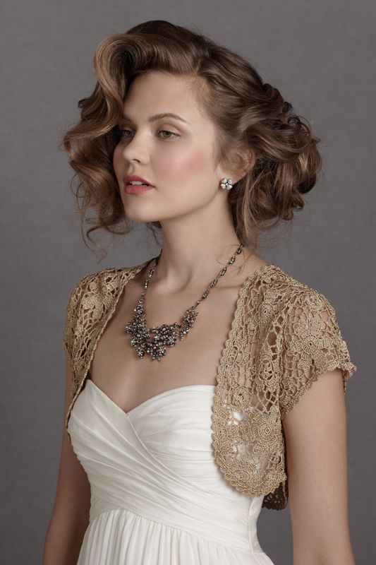 A taupe crochet bolero is a chic coverup idea for a fall or winter bride, you can also DIY it