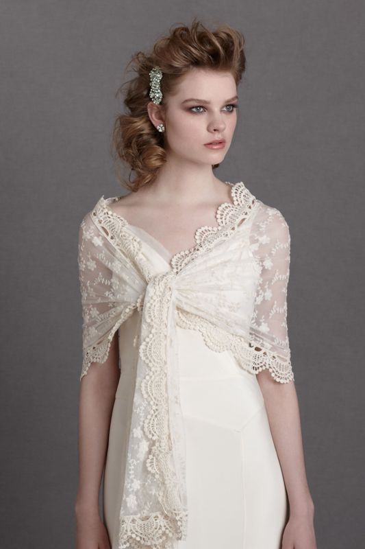 A neutral lace coverup that can be tied up looks pretty and vintage like, add a touch of romance to your look