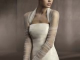 a sheer white coverup with long sleeves is a timeless idea to pair with your wedding dress