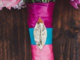 a pink and blue bouquet wrap with a metallic leaf accent is amazing for nature lovers and a colorful wedding