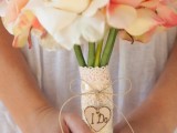 a lace wrap with twine and a small wooden heart that is wood burnt is a very cute rustic idea