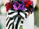 a black and white ribbon bouquet wrap is a gorgeous idea for a bold and cool wedding bouquet
