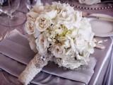 a super glam and shiny wedding bouquet wrap with pearls, beads and rhinestones