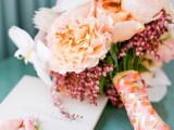 a colorful ribbon bouquet wrap is a bold and fun idea for a spring or summer wedding