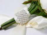a glam ribbon and pearl wedding bouquet wrap for a glam and refined wedding bouquet