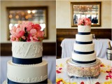 a white textural wedding cake with navy ribbons and coral pink blooms on top is a chic idea