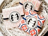 printed coral napkins with navy napkin rings and monograms are a very fun and cute idea