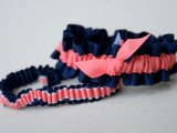 navy and coral garters with bows are a fun and sexy accessory idea to go for