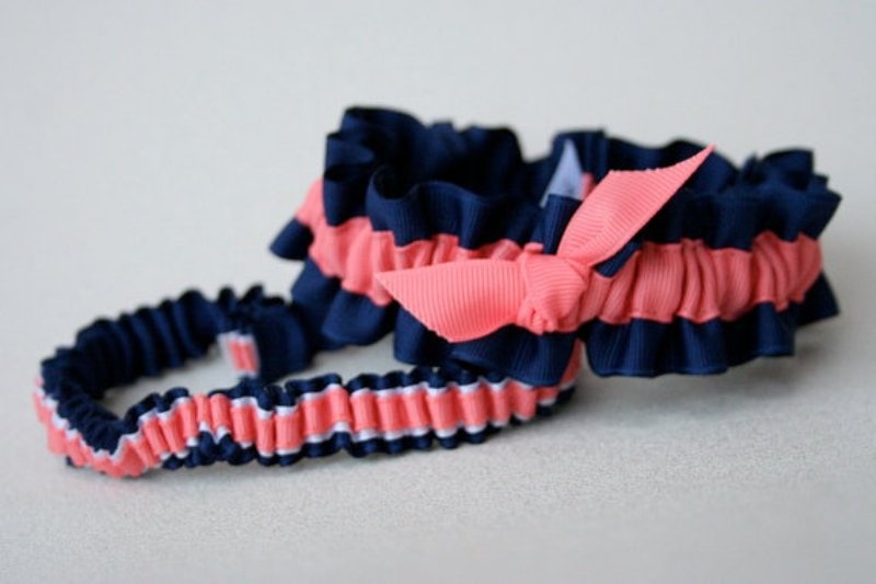 Navy and coral garters with bows are a fun and sexy accessory idea to go for