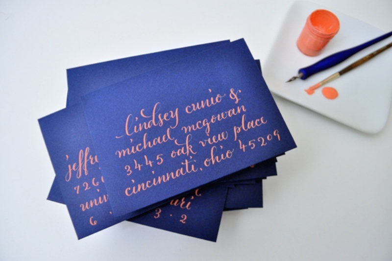 Navy and coral wedding cards look super bold and unusual, such a bright combo
