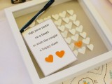 a frame with hearts to leave wiches and monograms and names – insert these hearts into the frame