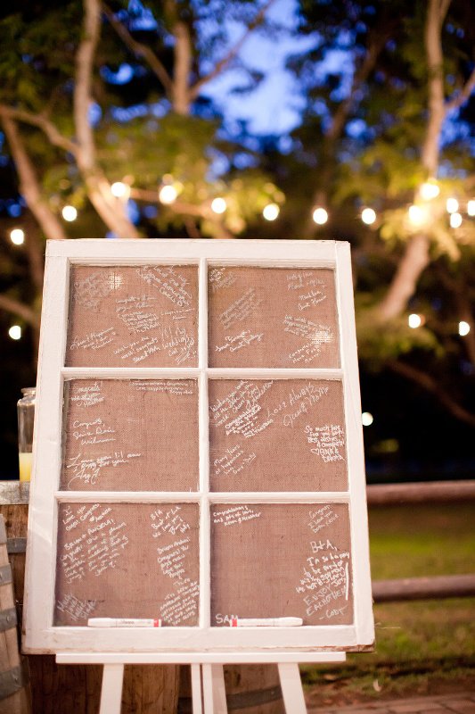 A vintage window frame with burlap to write on is a very cool idea for a rustic wedding