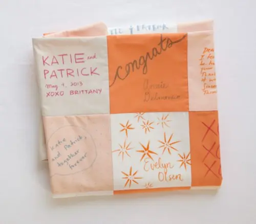 a patchwork blanket that can be DIYed - each patch is signed by a guest - it's a very bold and unique idea