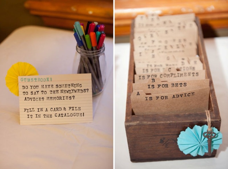 a card box with vintage cards is a rustic guest book idea that are to be signed by the guests for a vintage wedding