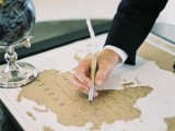 a map of the world as a wedding guest book can be signed by the guests – show off the parts of the wolrd where you’ve been