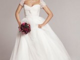 an A-line wedding dress with a sweetheart neckline, embellished short sleeves is gorgeous