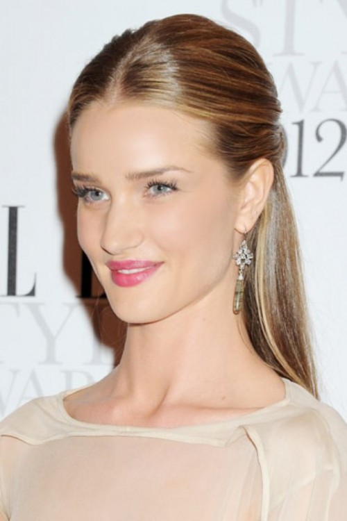 a minimalist wedidng half updo with a sleek top and straight hair down is chic and timeless
