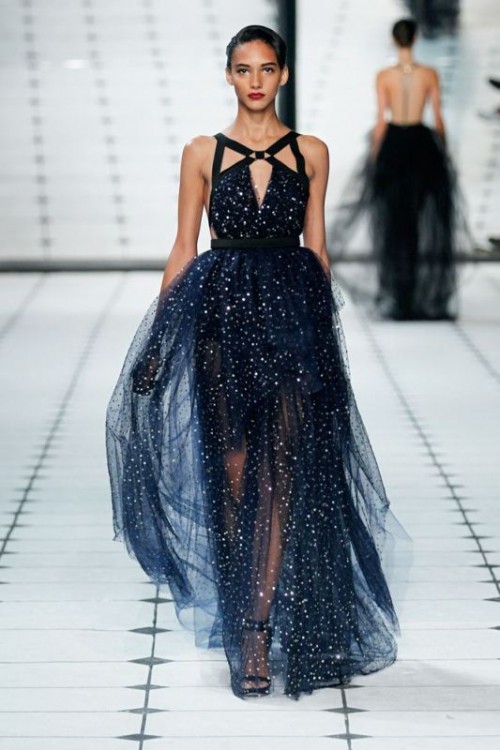 a celestial wedding dress in midnight blue, with shiny touches and black straps looks fantastic and breathtaking