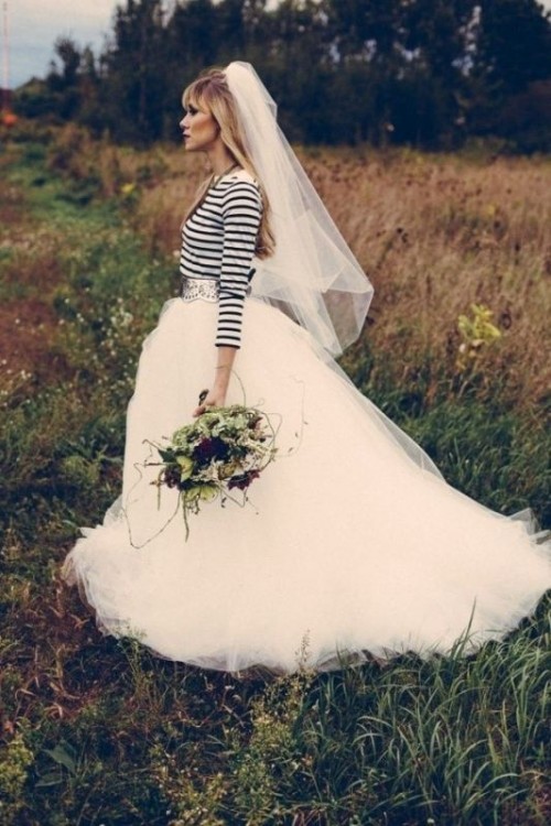 a striped top, a full tutu skirt with a train and a veil for an out of the box bridal look