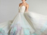 a strapless wedding ballgown with an embellished bodice, a pastel skirt that wows with a play of colors
