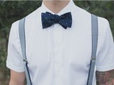 a polka dot midnight blue bow tie is a stylish idea to spruce up your groom’s look