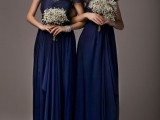 elegant midnight blue bridesmaid dress with lace bodices and short sleeves and layered skirts
