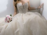 a super glam grey princess wedding dress with a fully embellished bodice with a sweetheart neckline and a layered skirt is a dreamy and beautiful idea to rock