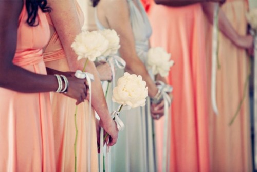 coral and mint maxi bridesmaid dresses and creamy blooms to carry for a chic and bold wedding