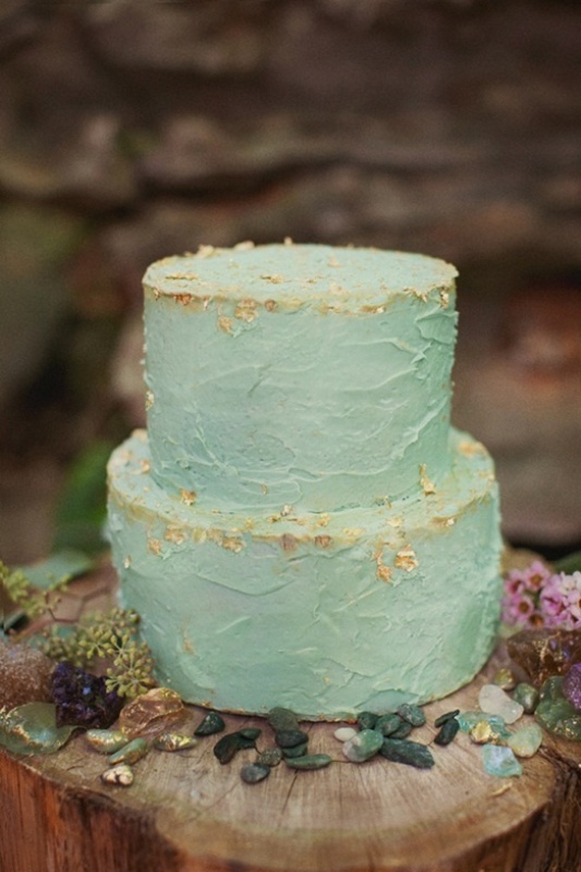 A textural mint colored wedding cake with gold leaf on the edges is a fantastic idea for a modern wedding with a trendy touch