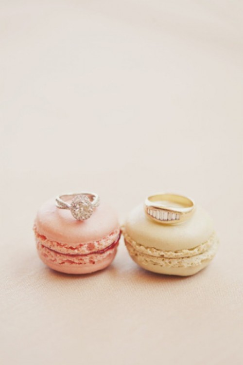 coral and creamy macarons can be used to show off your wedding rings or given as favors or desserts