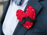 a fun and bold red fabric heart with a moustache boutonniere, which symbolizes the groom and adds a bit of fun to his look