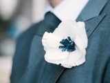 a large white paper anemone boutonniere is a fresh and very eco-friendly solution for those who want flowers