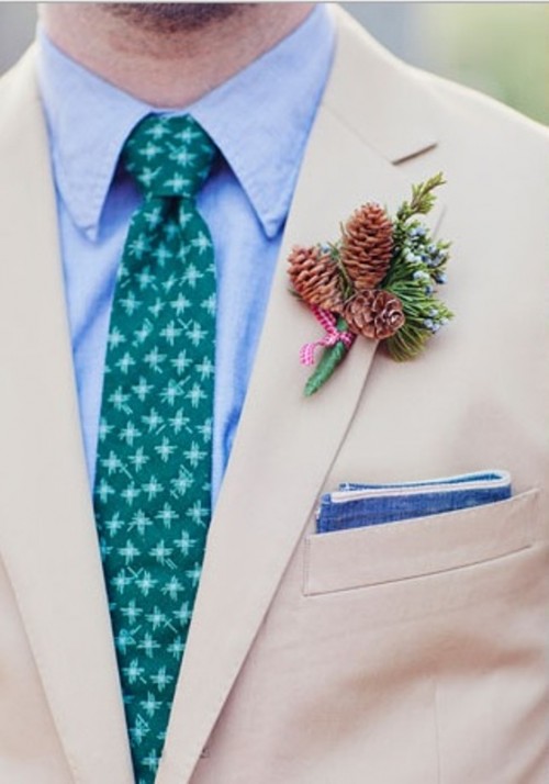 a pretty pinecone and evergreen wedding boutonniere is a lovely solution for a fall woodland or a winter wedding