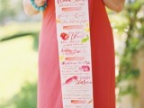 a long menu with colorful touches is a creative and fun idea for a bright summer wedding